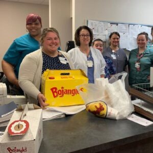 nurses with catering boxes